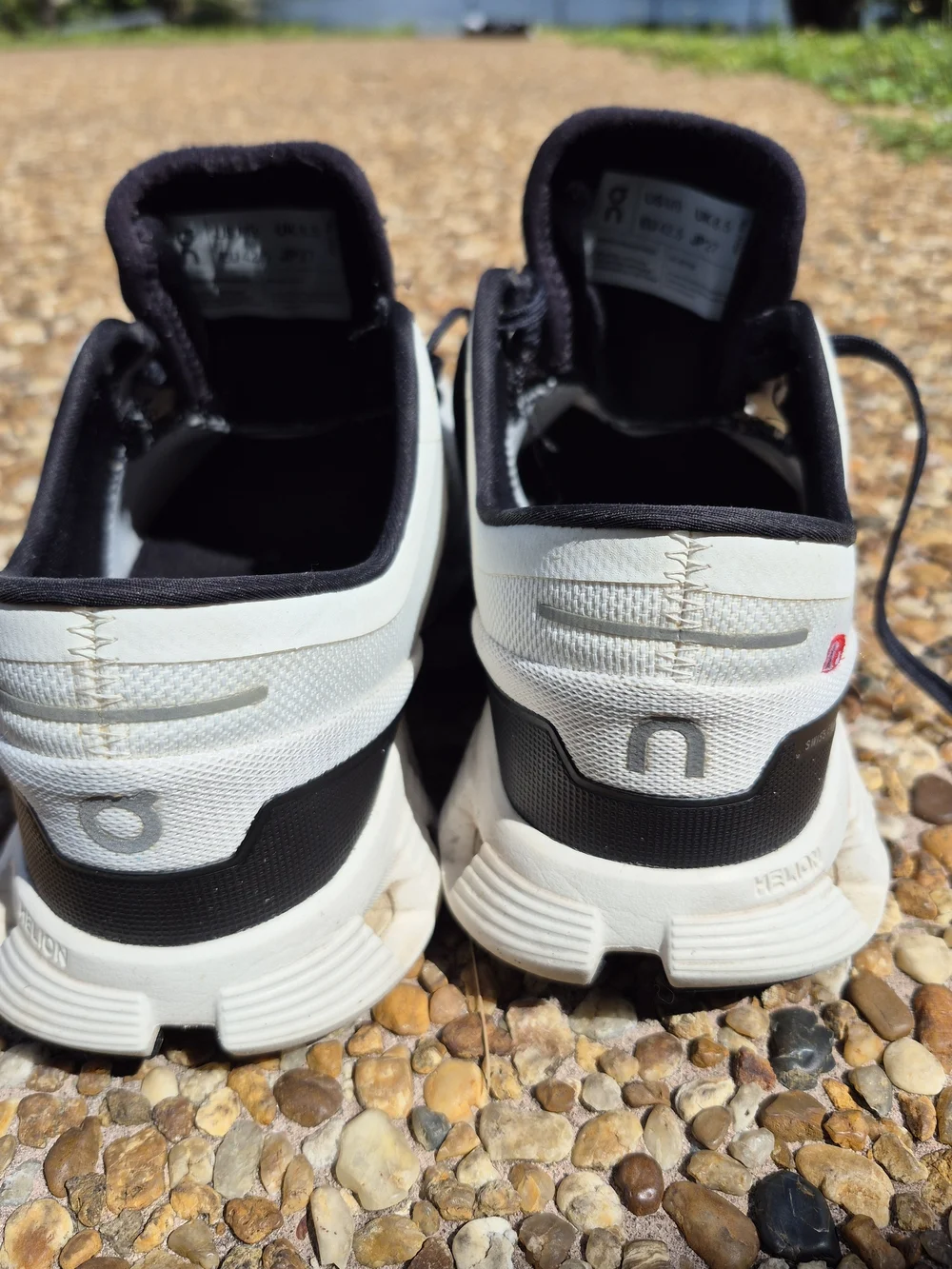 On Running Men’s Cloud Athletic Sneakers in White and Black